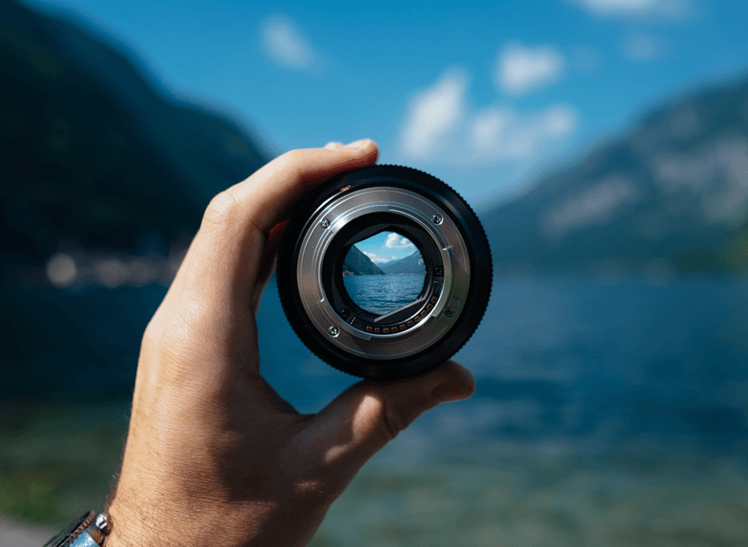 Shutter lens being held by a hand